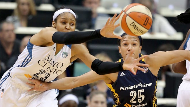 Indiana Fever guard Marissa Coleman (25) defends Minnesota Lynx forward Maya Moore (23) in the first half of their game. The Indiana Fever play the Minnesota Lynx in Game #5 of the WNBA Finals Wednesday, October 14, 2015, evening at Target Center in Minneapolis MN.