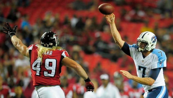 Titans quarterback Zach Mettenberger throws a pass past Falcons outside linebacker Tyler Starr during the fourth quarter.