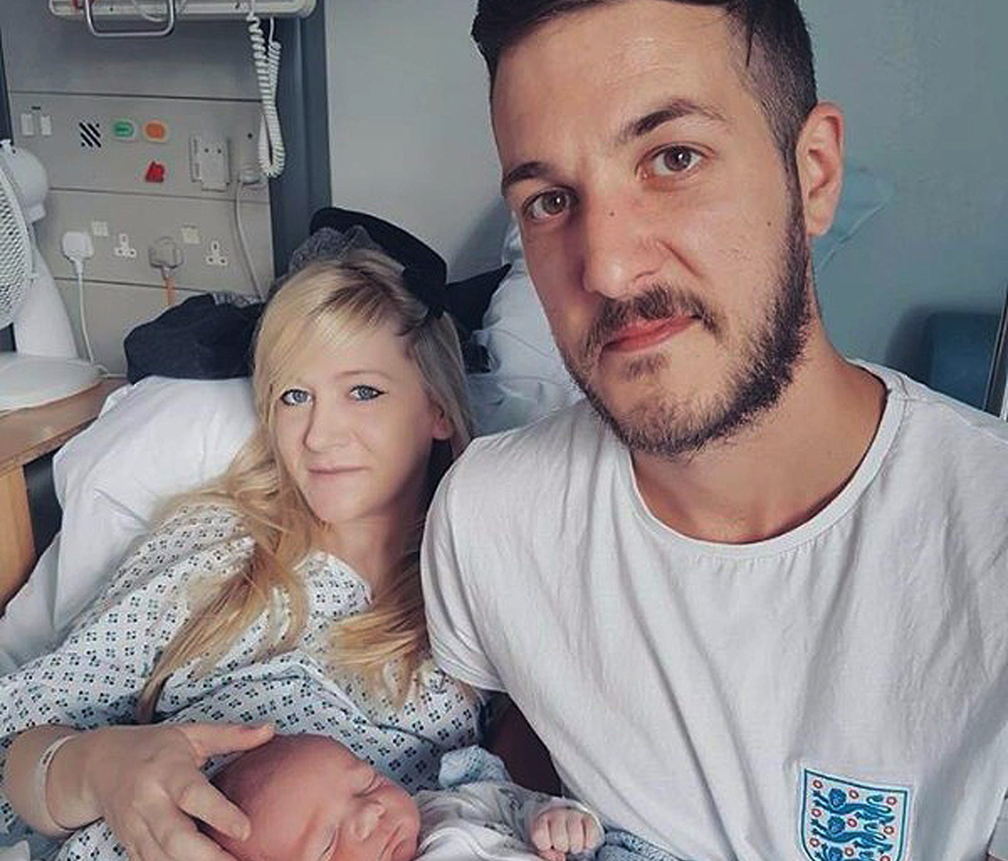 This is an undated hand out photo of Chris Gard and Connie Yates with their son Charlie Gard provided by the family, at Great Ormond Street Hospital, in London.