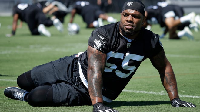 Oakland Raiders' Vontaze Burfict stretches during NFL football practice on Tuesday, June 4, 2019, at the team's training facility in Alameda, Calif. (AP Photo/Ben Margot)