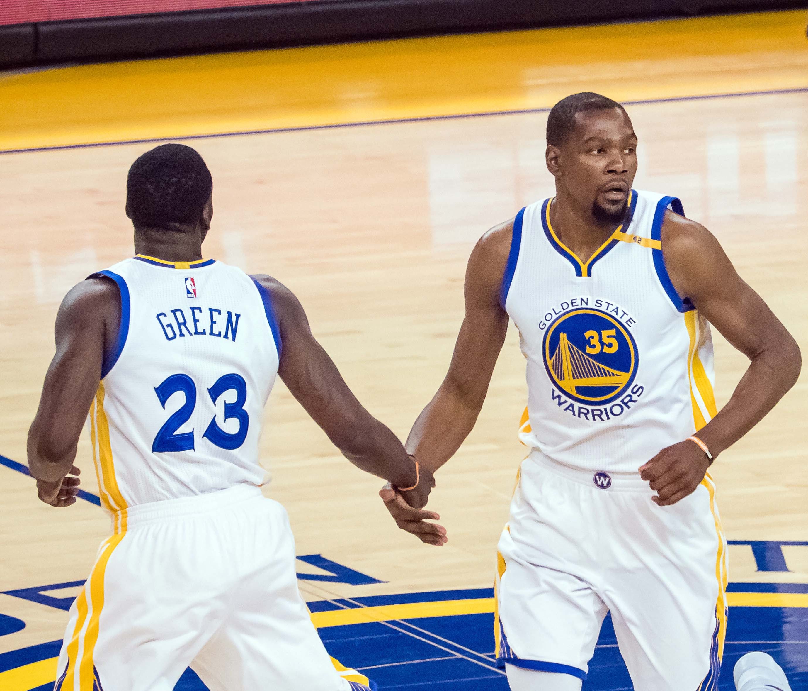 The Golden State Warriors' Kevin Durant (35) and Draymond Green enjoyed a Game 2 rout of the Spurs.