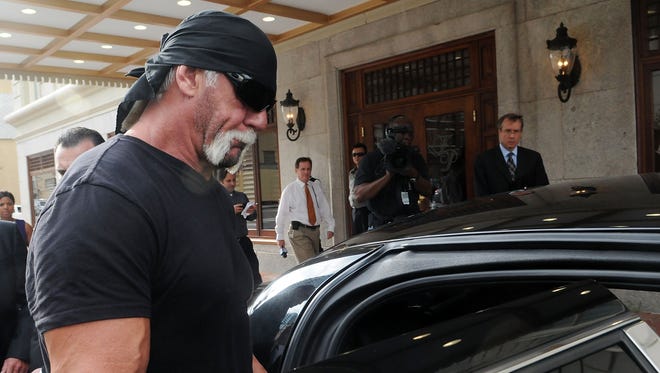 Terry Bollea aka Hulk Hogan leaves the press conference in 2012.