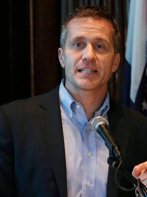 Missouri Gov. Eric Greitens speaks at a news conference about allegations related to his extramarital affair with his hairdresser, in Jefferson City, Mo., Wednesday, April 11, 2018. Greitens initiated a physically aggressive unwanted sexual encounter with his hairdresser and threatened to distribute a partially nude photo of her if she spoke about it, according to testimony from the woman released Wednesday by a House investigatory committee. (J.B. Forbes/St. Louis Post-Dispatch via AP)