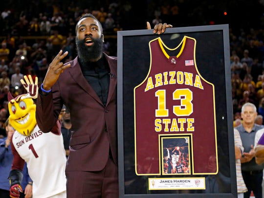 James Harden reacts during a ceremony honoring his