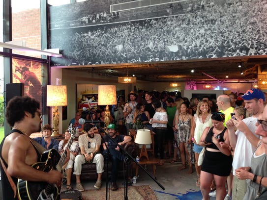 Tash Neal [left) rocks the crowd at the Danny Clinch's