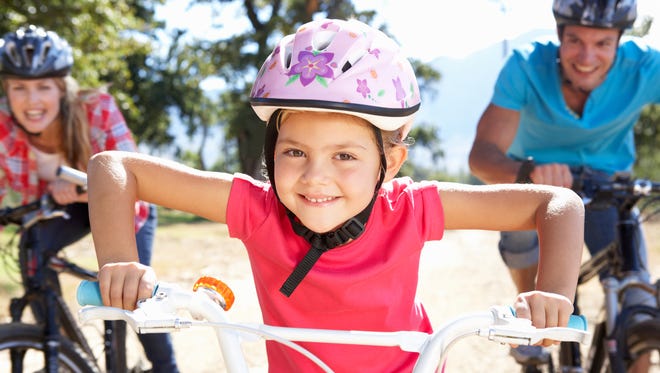 Family bike rides, walks and group sports keep everyone more active.