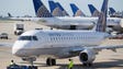A United Express Embraer E170 jet prepares for departure