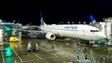 A United Airlines Boeing 737-900 rests at a gate at