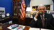 Pence talks on the phone on Nov. 15, 2006, in his office