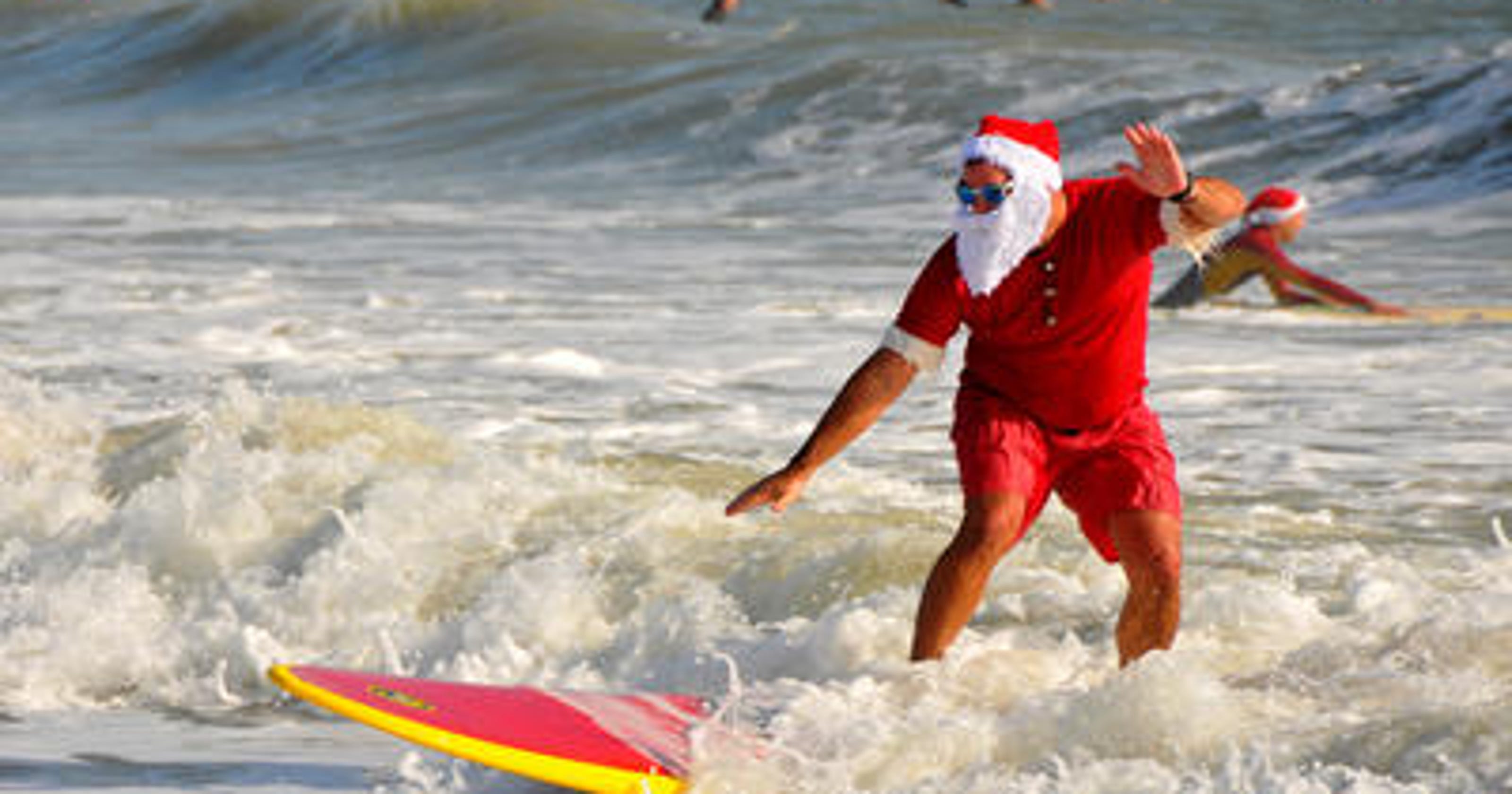 Walk with us to see Surfing Santas in Cocoa Beach