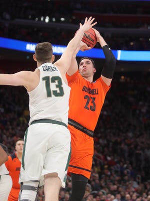 Michigan State forward Ben Carter defends Bucknell forward Zach Thomas during the second half of the NCAA tournament game Friday, March 16, 2018 at Little Caesars Arena.