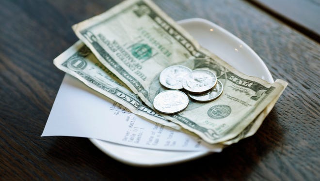 A waitress received a 130% tip -- and a note she'll remember forever.