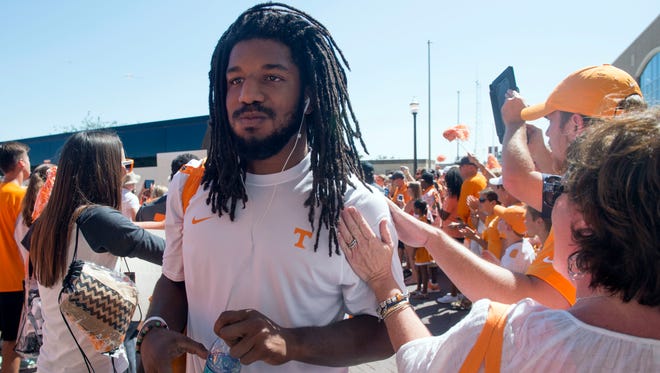 Tennessee linebacker Jalen Reeves-Maybin (21) is greeted by Tennessee fans as the team arrives at Texas A&M on Saturday, October 8, 2016. (SAUL YOUNG/NEWS SENTINEL) 