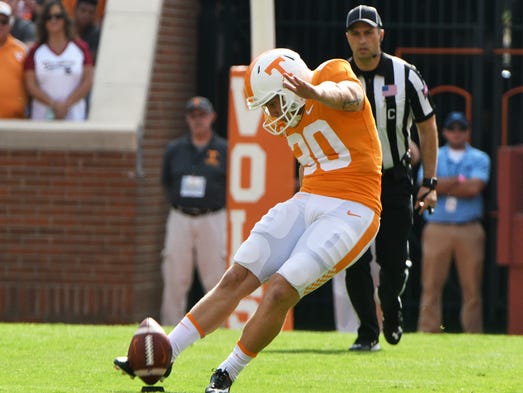 Tennessee place kicker Brent Cimaglia (30) kicks the