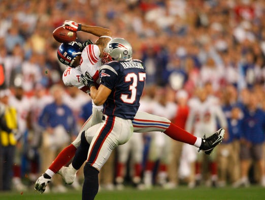 Super Bowl XLII (Giants 17, Patriots 14): New York Giants wide receiver David Tyree hauls in a catch against his helmet to sustain the game-winning drive.