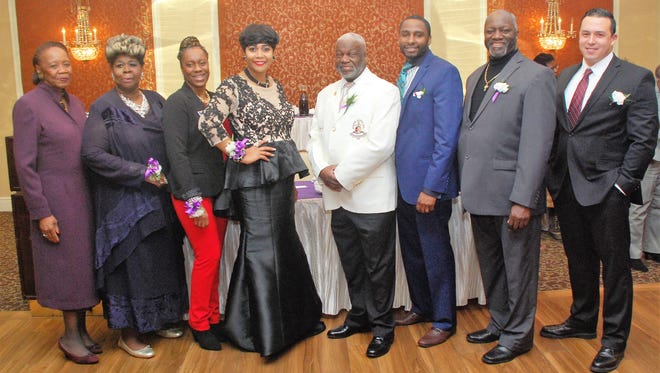 Shirley A. Adams, left to right, Sharlene Stout, Lana Williams-Scott, Ondie James, Wesley J. Lee,the  Rev. Michael Bell Jr., the Rev. Gilbert J. West Sr and Edwin Ramirez Jr. were honored during the Poughkeepsie Neighborhood Club's annual Lincoln-Douglass Luncheon Feb. 11.