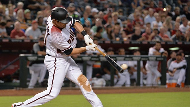 Jul 24, 2017: Arizona Diamondbacks outfielder A.J. Pollock (11) hits a two run RBI double in the second inning of the game against the Atlanta Braves at Chase Field.