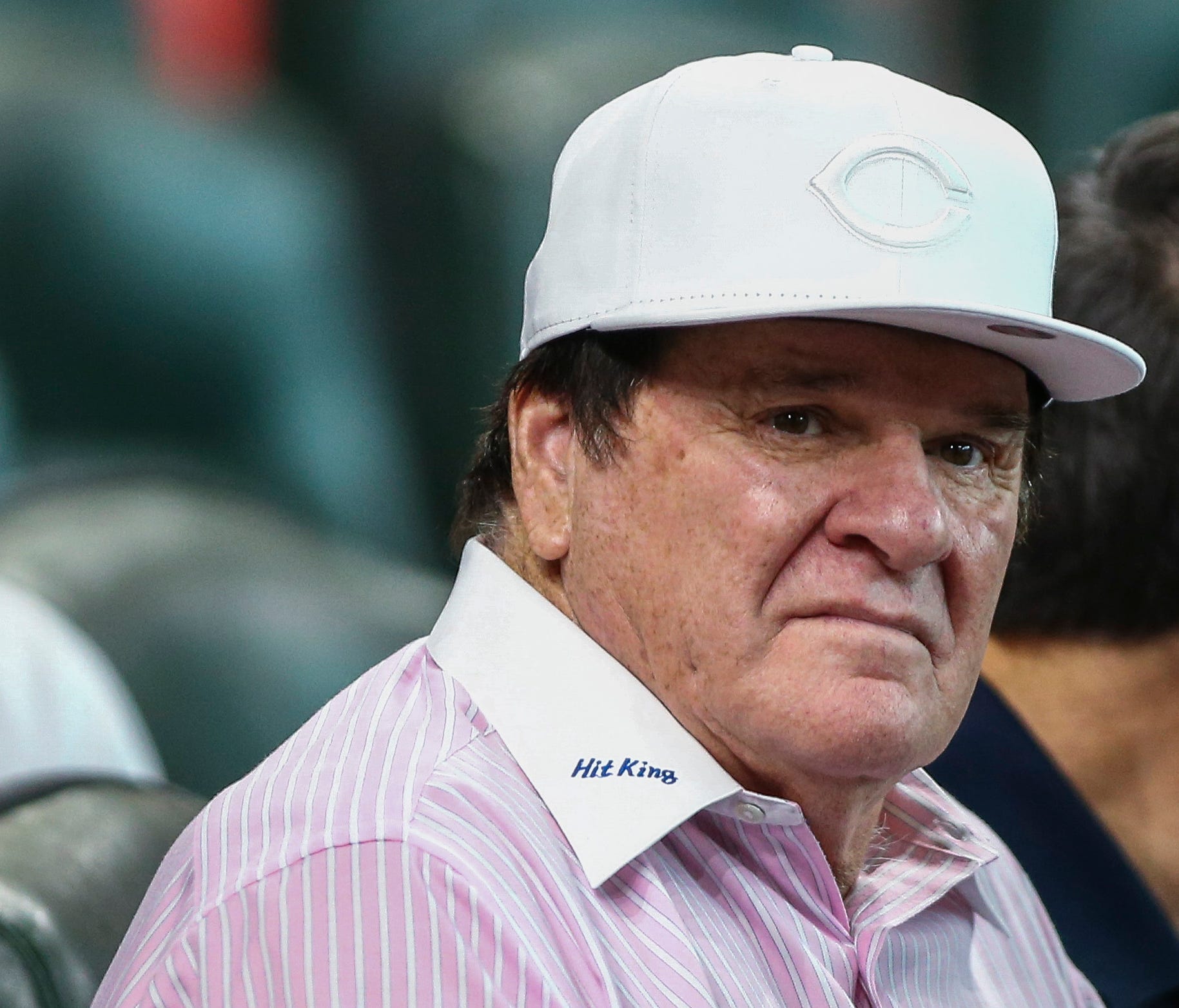 Former major league player and manager Pete Rose watches a game between the Houston Astros and the Cincinnati Reds at Minute Maid Park on June 17, 2016.