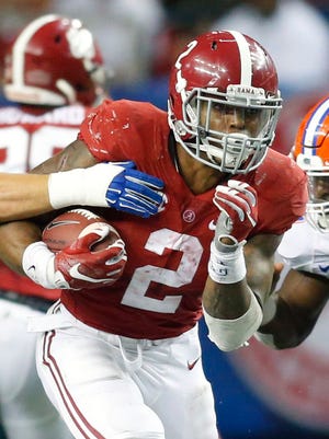 Can Alabama's Derrick Henry emerge from a competitive crowd to win the Heisman Trophy this week?
