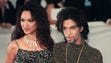 Prince poses with his first wife Mayte as they arrives