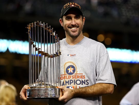 Justin Verlander #35 of the Houston Astros holds the