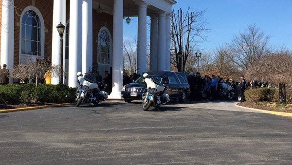 Mourners gather for the funeral of Prince William County Police Officer Ashley Guindon at Hylton Memorial Chapel in Woodbridge, Va., March 1, 2016.