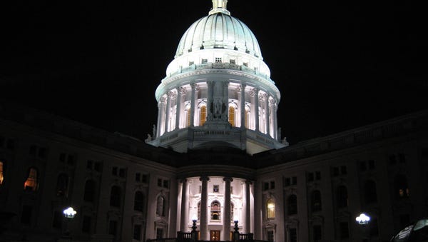 The Wisconsin Capitol building at night.