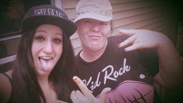 Ashley Rich (left) and her friend, Denise Crisman, have fun taking goofy photos during a cookout. Rich was shot and killed Sunday, Aug. 27, in the apartment she shared with her boyfriend.