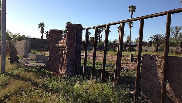 A reader sent in this eyesore: a fence made of slump block and wood, which collapsed and fell onto its side in northeast Phoenix.