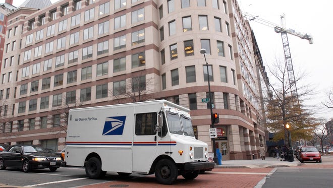 The U.S. Postal Service says dogs attacked letter carriers more than 6,500 times in 2015.