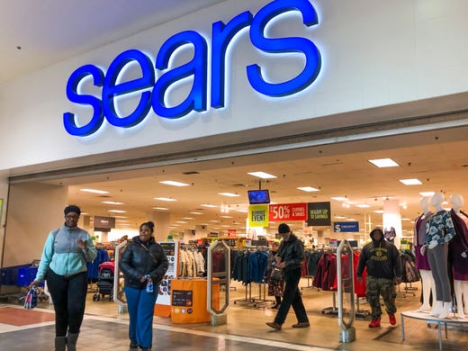 Customers shop at a Sears department store in Riverside,