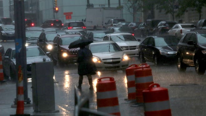 Heavy rain and construction on many streets in downtown Detroit made for a rough commute to work as many roadways reported problems all over the metro Detroit area on Thursday, September 29, 2016.