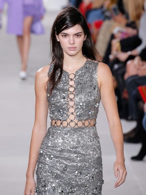 Model, Kendall Jenner, walks the runway wearing Michael Kors Fall 2016 during New York Fashion Week.