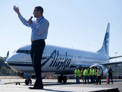 Alaska Airlines CEO Brad Tilden speaks to a crowd during
