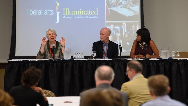 Carol Christ, left, Robert Hackett and Mary Dana Hinton take part in a panel discussion on access as part of the Liberal Arts Illuminated conference Tuesday, July 12, at the College of St. Benedict in St. Joseph.