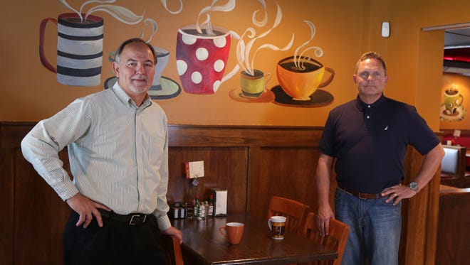 Steve Britton, left, and owner Mark Linebach,  are working to create franchise from Linebach's popular local restaurants Cozy Cafe.