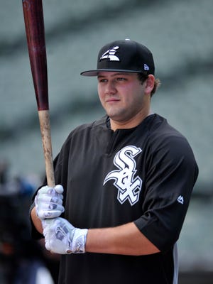 Chicago White Sox 2017 first-round draft pick Jake Burger looks on during batting practice before a baseball game between the Chicago White Sox and the New York Yankees, Monday, June 26, 2017, in Chicago. (AP Photo/Paul Beaty)