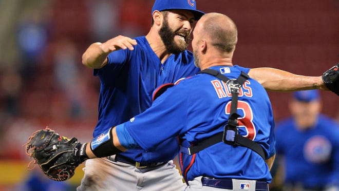 CINCINNATI, OH - APRIL 21: Jake Arrieta #49 of the Chicago Cubs celebrates with catcher David Ross #3 of the Chicago Cubs after throwing a no-hitter against the Cincinnati Reds at Great American Ball Park on April 21, 2016 in Cincinnati, Ohio. Chicago defeated Cincinnati 16-0. (Photo by Jamie Sabau/Getty Images)