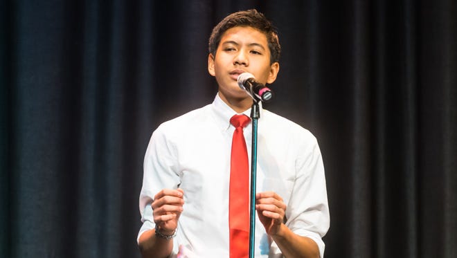 Francis Virtucio recites 'Speak' by Phillip B Williams during the Poetry Out Loud Competition at Vineland High School on Tuesday, January 16.