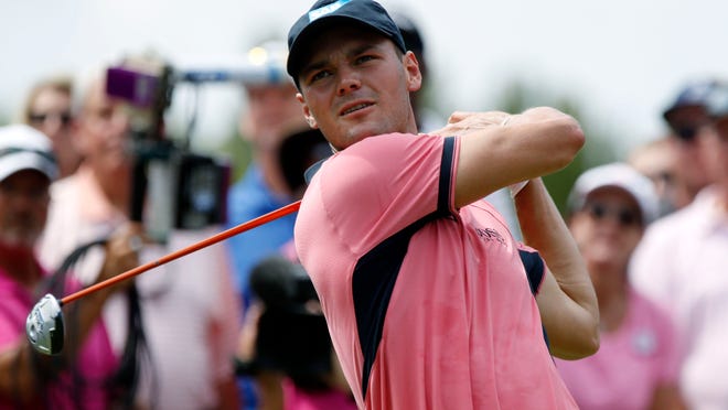 
Martin Kaymer tees off on the fourth hole on Sunday during the final round of The Players Championship at TPC Sawgrass.
