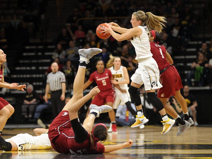 Iowa's Makenzie Meyer grabs a loose ball during the
