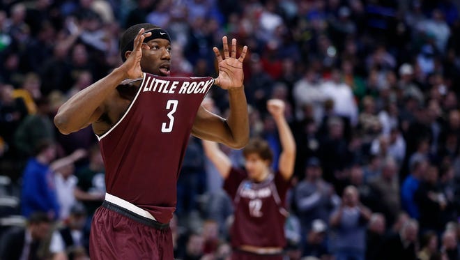 Arkansas Little Rock Trojans guard Josh Hagins (3) celebrates after winning during Purdue vs Arkansas Little Rock in the first round of the 2016 NCAA Tournament at Pepsi Center. Arkansas Little Rock Trojans won 85-83 over Purdue Boilermakers.