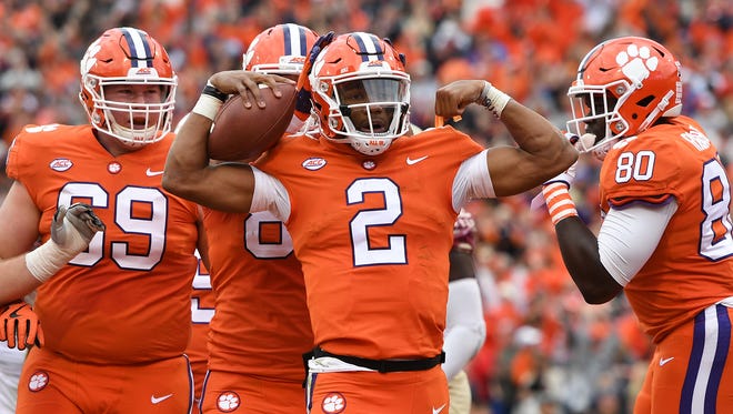 Clemson quarterback Kelly Bryant (2) reacts after scoring against Florida State during the 1st quarter on Saturday, November 11, 2017 at Clemson's Memorial Stadium.