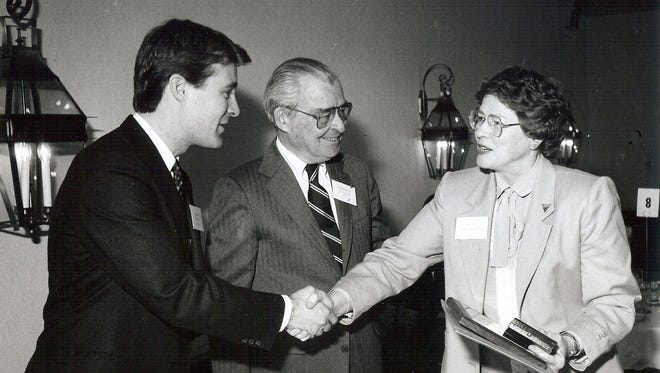 Sally Watlington meets with then-Indiana governor Evan Bayh, left, and then-Indianapolis Star publisher Gene Pulliam during the 1989 Jefferson Award ceremonies.