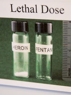 An illustration showing lethal doses of heroin and fentanyl is on display at the needle exchange program in Bloomington, Thursday, April 13, 2017. Monroe County is one of the counties in the state that have needle exchange programs.