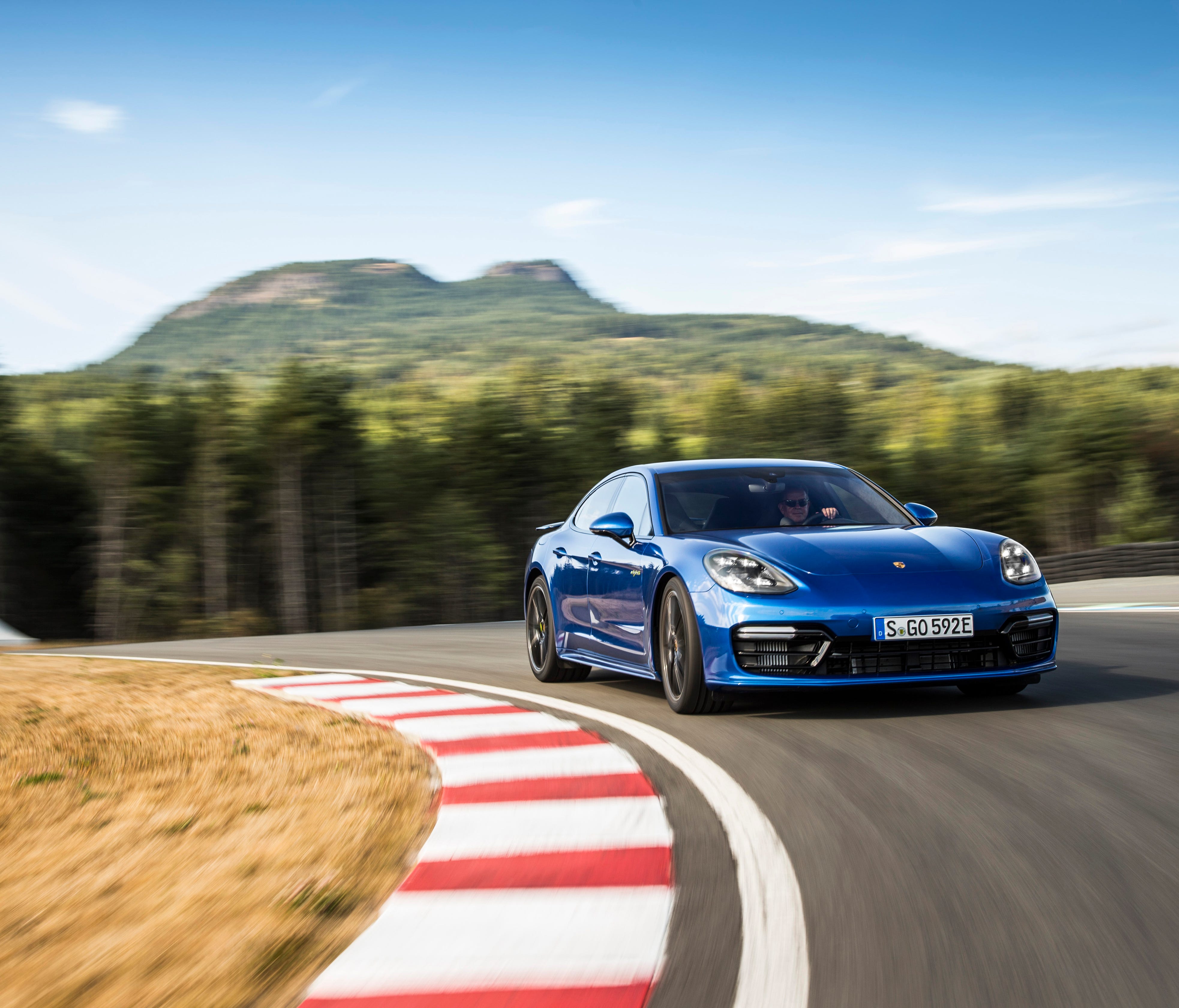 Porsche's Panamera Turbo S E-Hybrid is the top of the sedan food chain for the German automaker, and combines gas and electric power plants for explosive acceleration as well as all-electric cruising, a hint of things to come with the Mission E elect