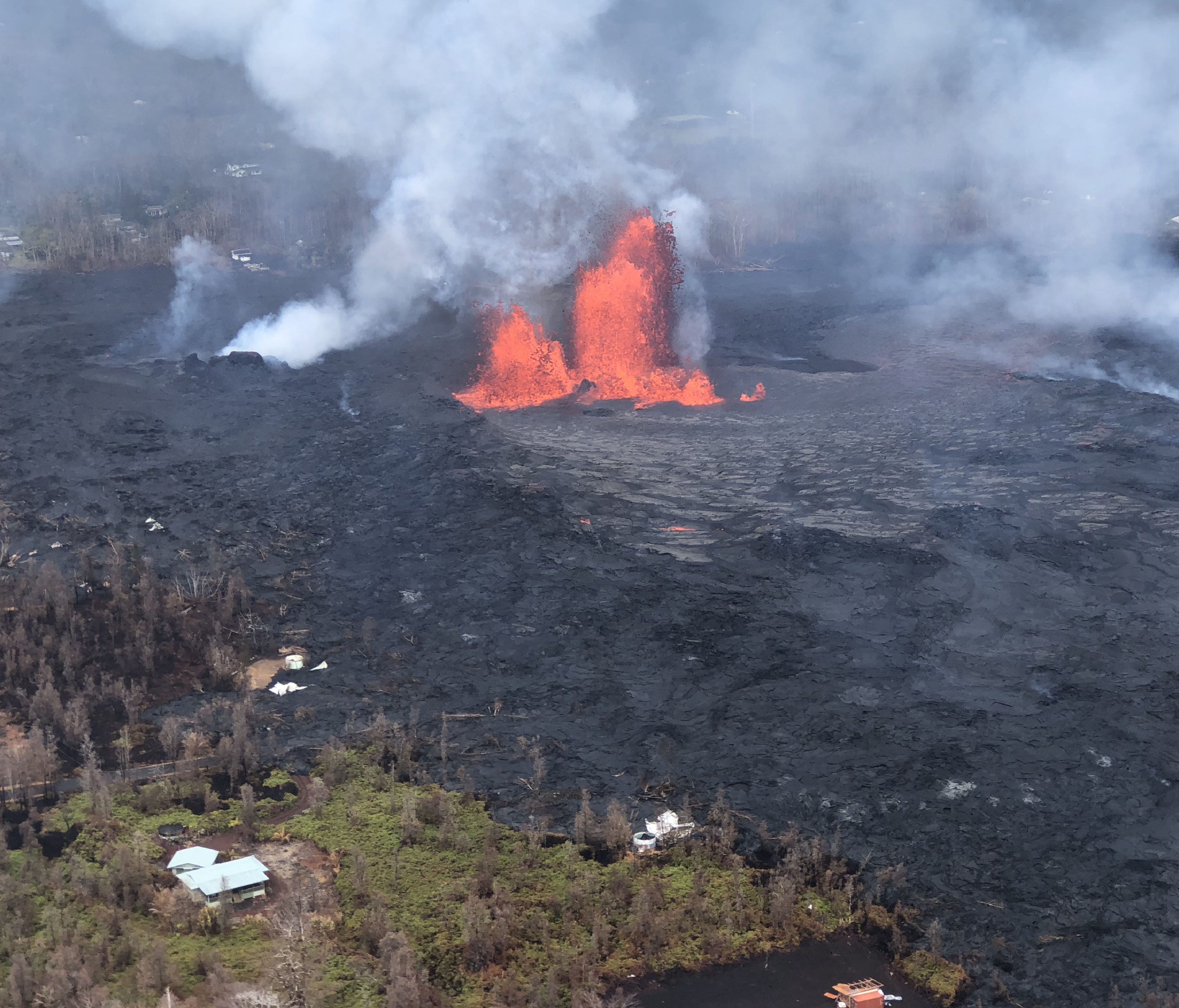 This image obtained May 30, 2018 from the US Geological Survey shows Fissure 8 reactivated on the afternoon of May 29,2018 when, at times, lava fountains were reaching heights of 200 feet and feeding a lava flow that advanced to the northeast at Kila