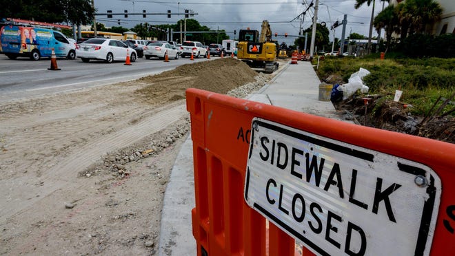 Construction continues on a right turn lane at the northeast corner of Northlake Boulevard and Military Trail in Palm Beach Gardens on Monday October 7, 2019.