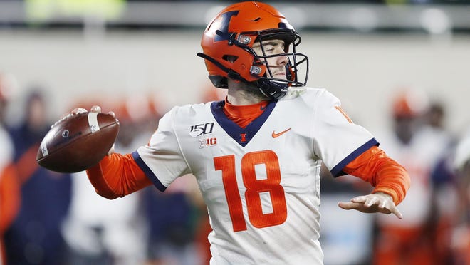In this Nov. 9, 2019, file photo, Illinois quarterback Brandon Peters throws during a game against Michigan State in East Lansing, Mich.