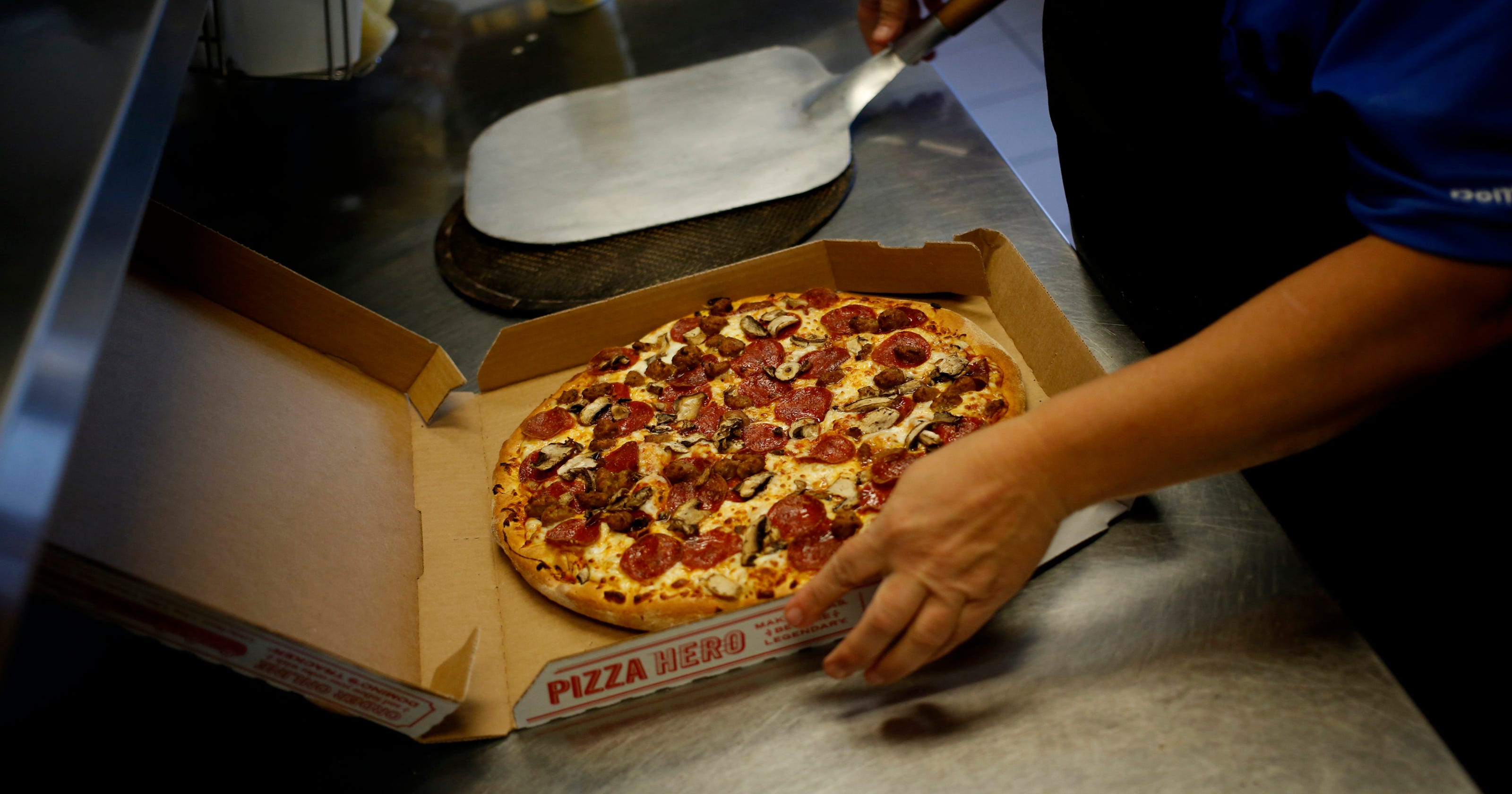 Domino's slices pizza prices in half this week